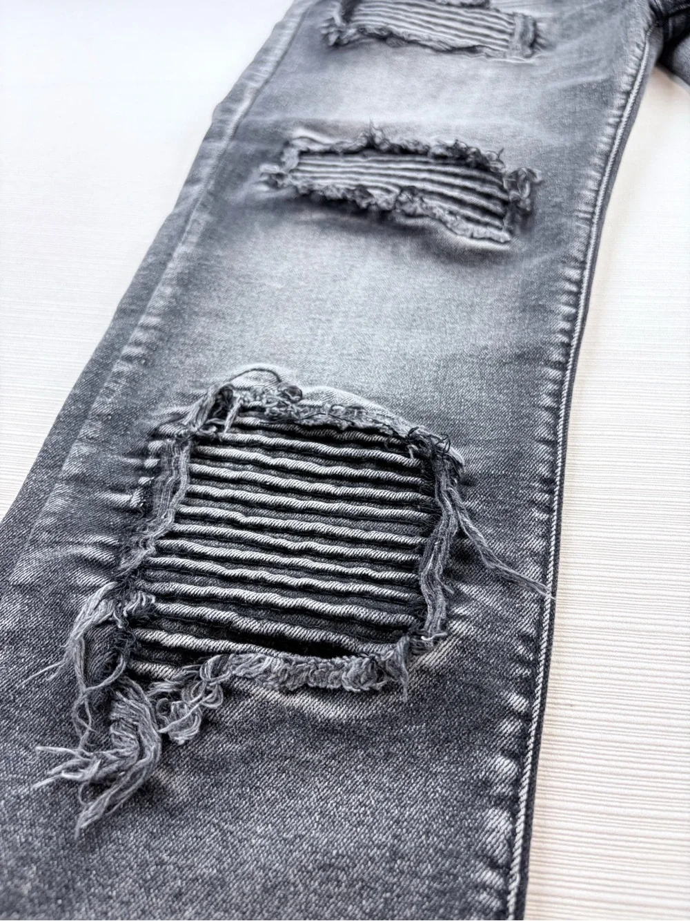 Distressed Black-Grey Skinny Jeans with Ripped Knee Panels